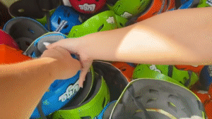 Ranz Kyle and Milissa accidentally hold hands while picking up their helmets