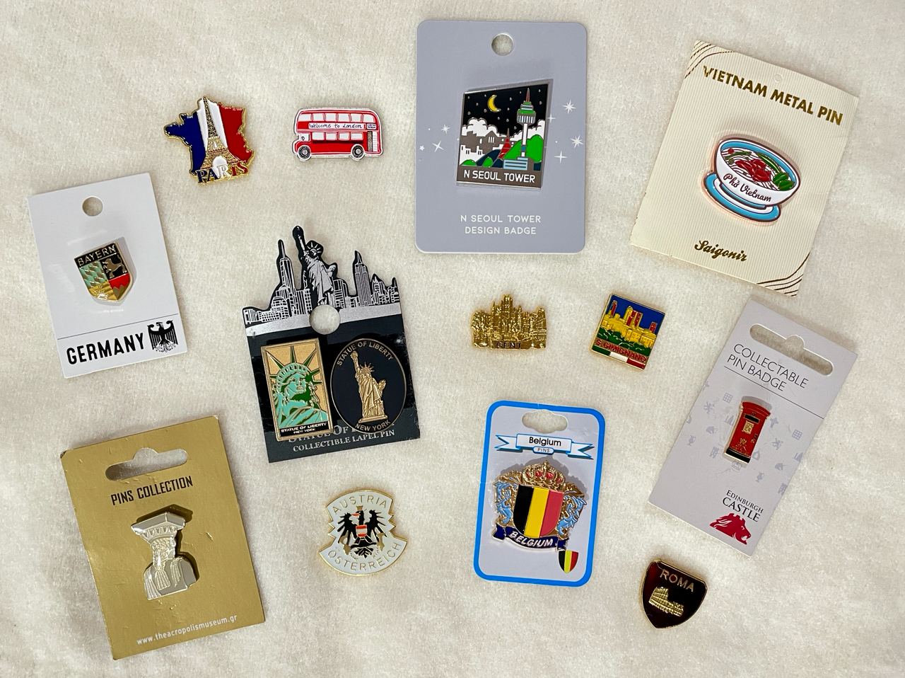 souvenirs trinkets enamel pins travel